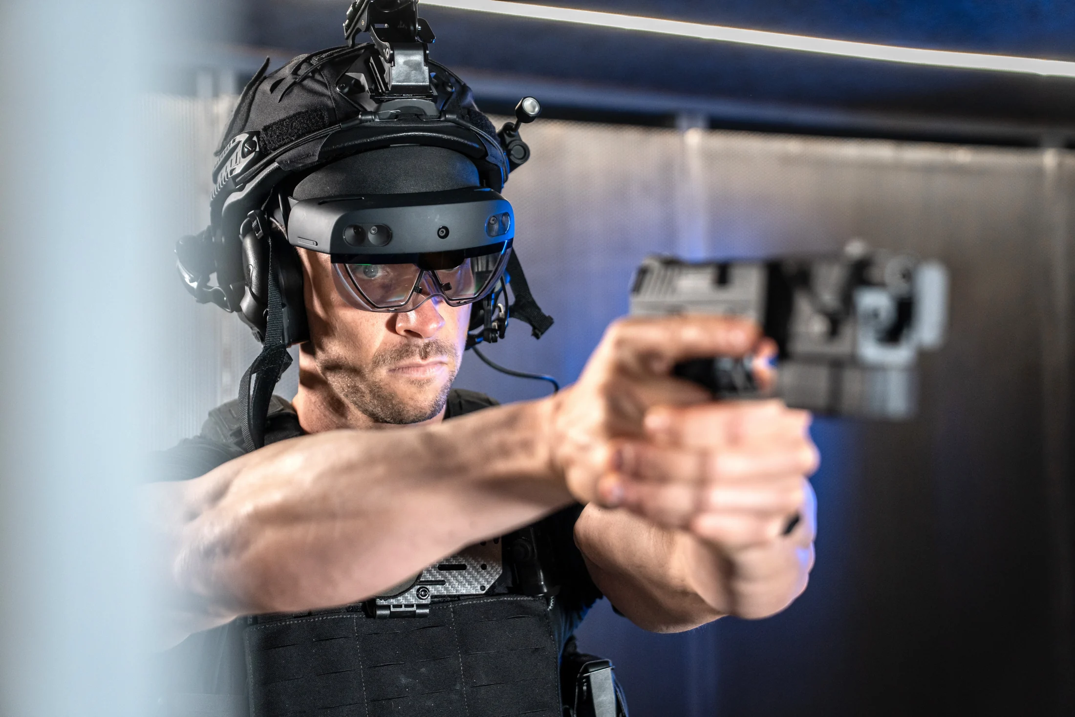 Participant wearing an artac Mixed Reality headset and using training equipment